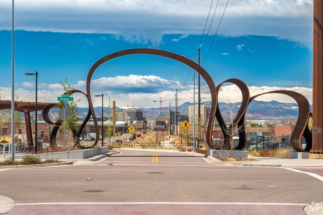 This fun sculpture can be found in at 39th and Steele, and marks the entrance to a paved path that takes you from Clayton to Cole.
