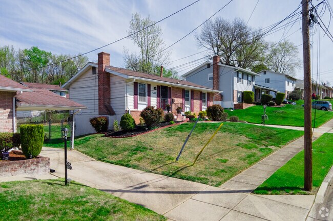 Ranch-style homes built into hillside are common in Peppermill Village.