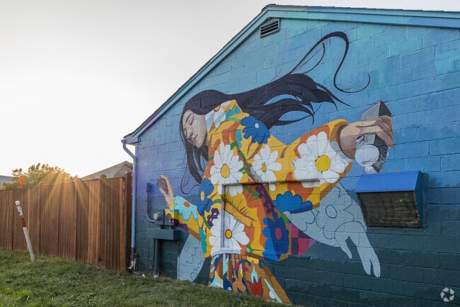 Colorful murals adorn Old Town Manassas, adding artistic flair to the urban landscape.