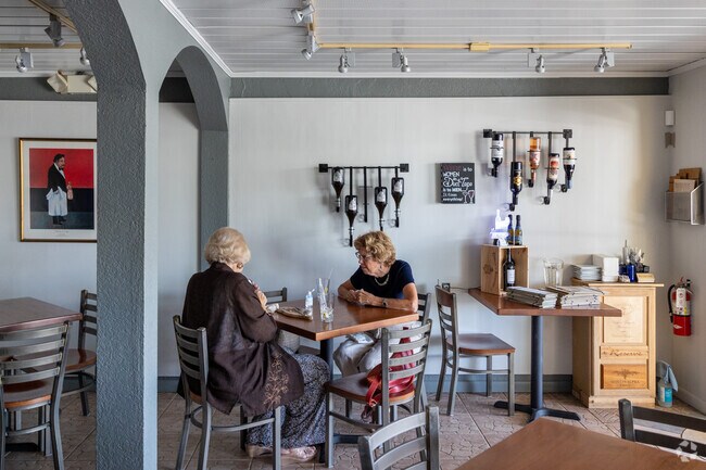 Vino Loco Wine Bar is a popular spot in Old Englewood Village to enjoy some wine & tapas.