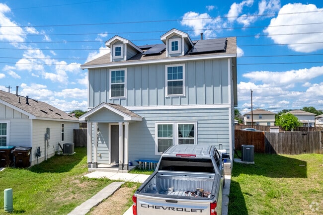 Modern two-story homes line neighborhoods throughout Converse, Texas.