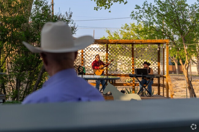 Locals enjoying live music at the Grey Mule Saloon in Fort Stockton.