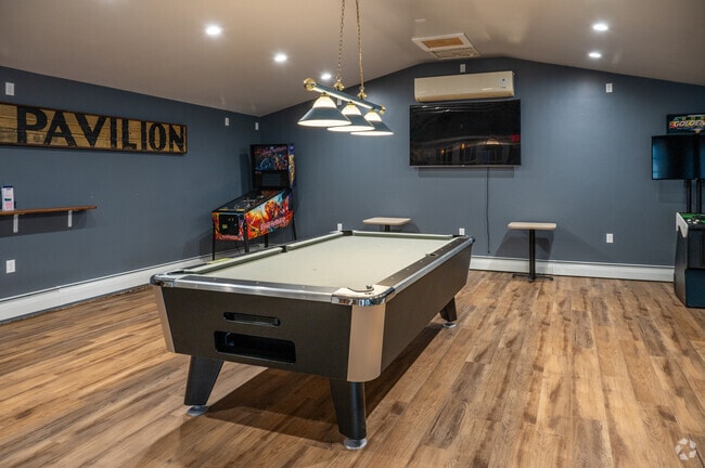 Play a game of pool at Deborah’s Down The Road, a popular spot in Lippitt-Harris.