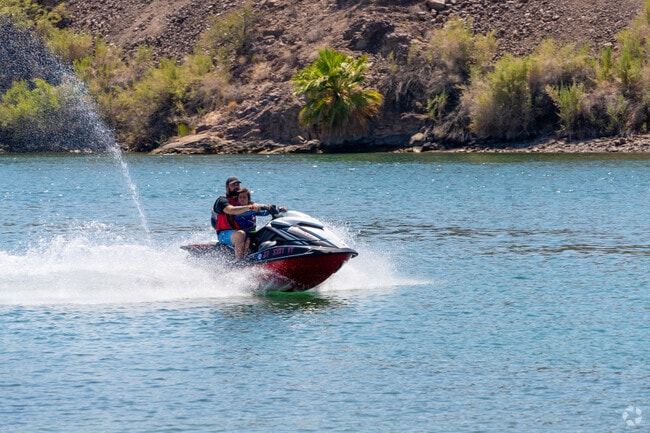 The summer calls for jet skiing together on the Colorado River, a favorite Parker weekend tradition.