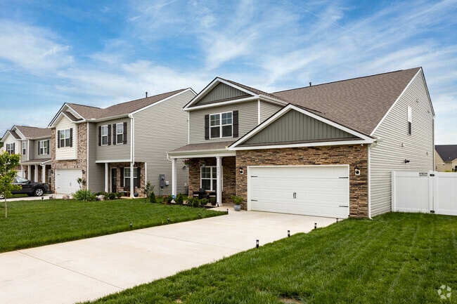 Colonial Revivals line the streets of newer subdivisions in Asbury-Forks of the River.
