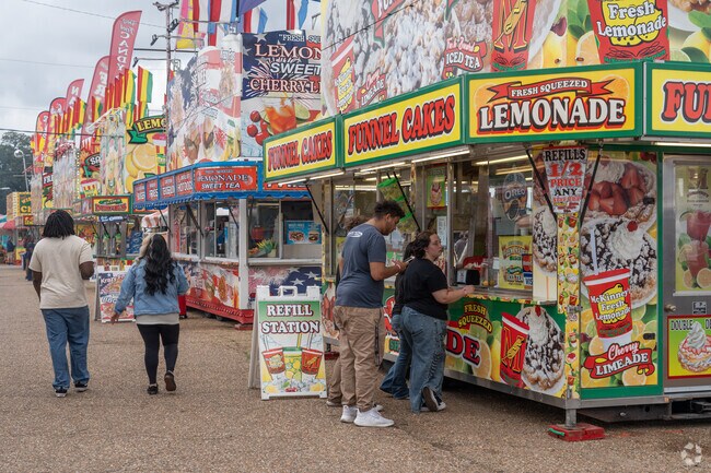 The fair offers diverse food, including fried Oreos and Cajun dishes.