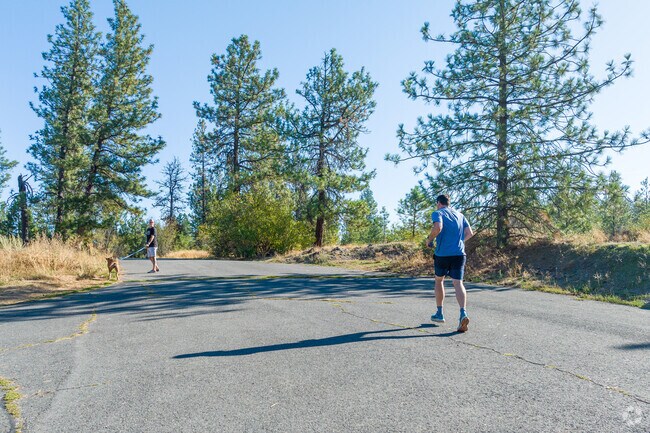 Residents in the Lincoln Heights neighborhood like to run the miles of trails in Lincoln park.