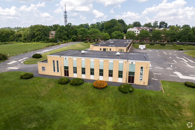 The sand-colored brick facade of St Eugene Elementary School is a familiar sight in Primos.