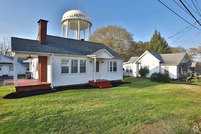 Cozy Bungalow in Liberty SC with the Liberty Water Tower in the Background