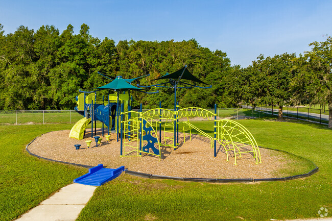 Kids laugh and have fun on the playgrounds at Longleaf Elementary in New Port Richey.