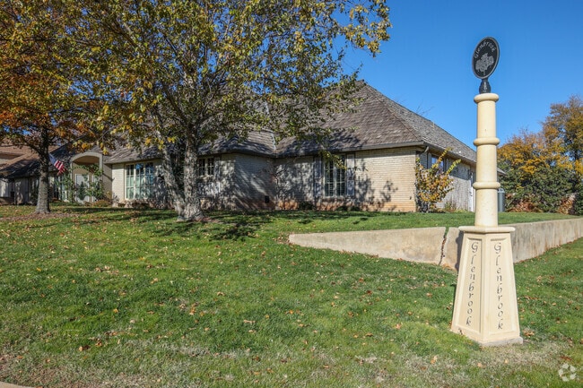 Signs for the Glenbrook neighborhood are peppered throughout its streets.