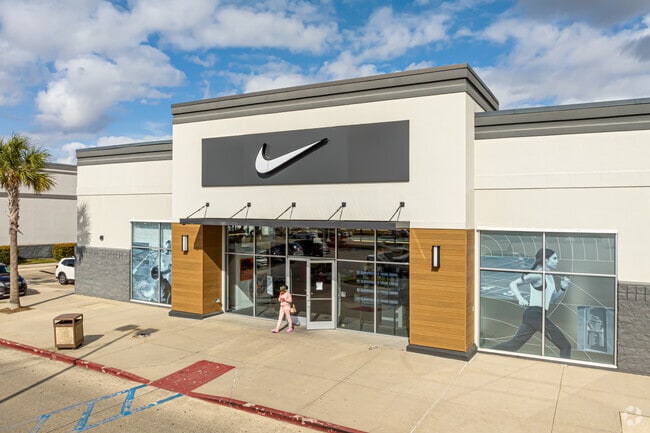 A Shopper in the  Elmwood Shopping Center