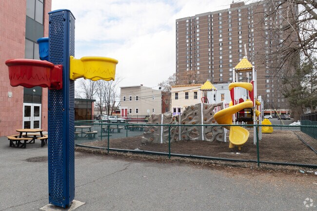 The back playground area at Roots Academy.