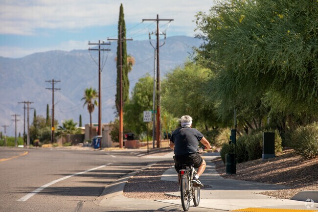 Residents enjoy mountain views while biking in Carson Corner.