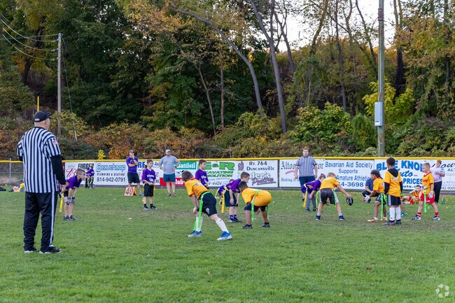 Kids in the Garfield area go to Vet's Field Baseball Park Garfield for organized flag football.