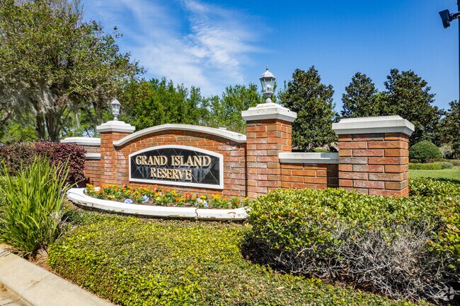 Brick entry sign to Grand Island's Grand Island Reserve community.