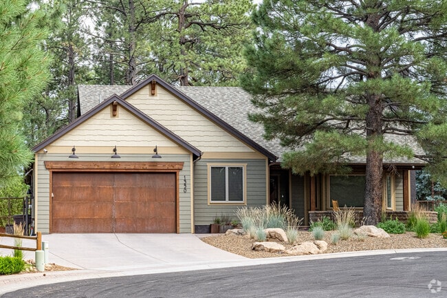 Small craftsman and ranch homes are popular styles all around University Heights in Flagstaff.