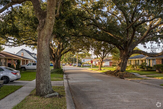 New Metairie blends 1960s charm with modern elegance amid mature tree-lined streets.