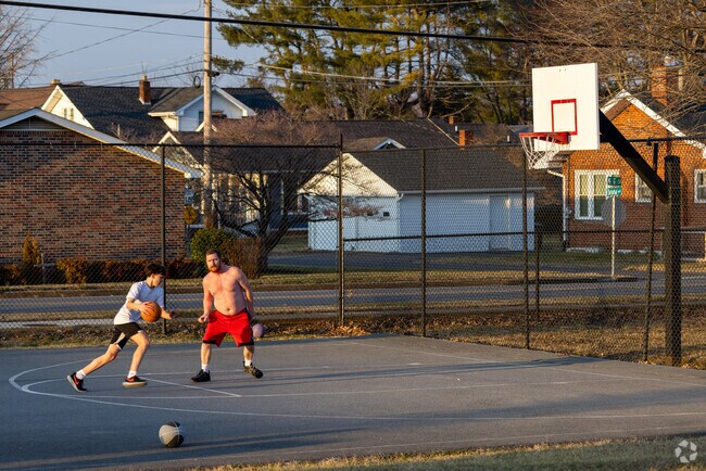 Play a game of basketball on the courts of Kiwanis park in Sycamore Shoals.