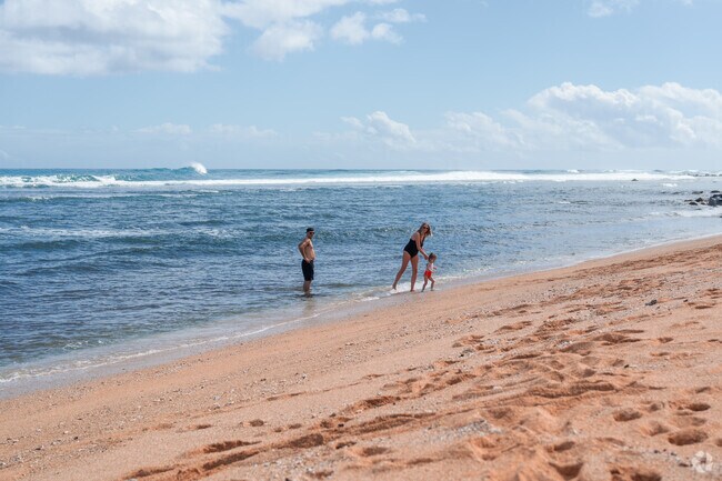 Visitors often enjoy snorkeling in Anahola Bay's crystal-clear waters.