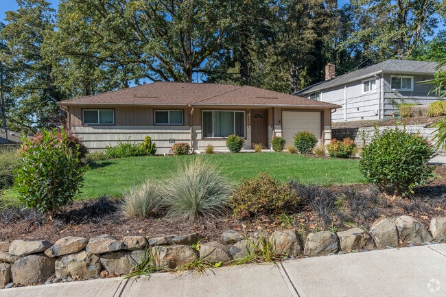 A beautifully landscaped Mid-Century Modest home in the South Salem neighborhood.