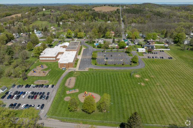 Elbridge Elementary offers students a large green space to play in.