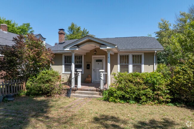 This bungalow has an artfully designed gabled front porch.