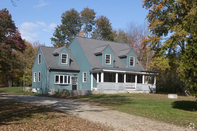 Cape Cod-style homes in Durham, Maine, showcase traditional New England design with gabled roofs and cozy interiors.