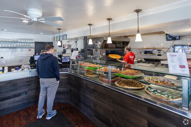 Avellino's serves fresh pizza and traditional Italian food in the neighborhood of Montrose.