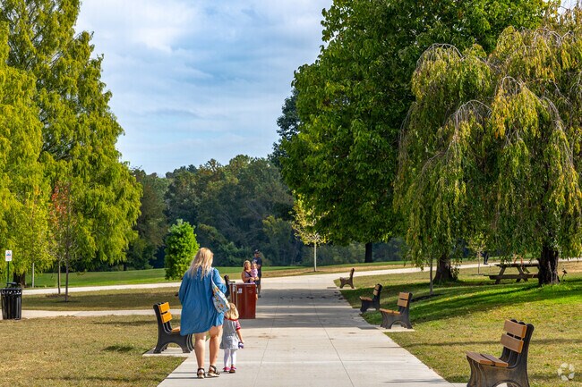 Walk along the paved paths over rolling hills in Upper Providence Township in Rose Tree Park.