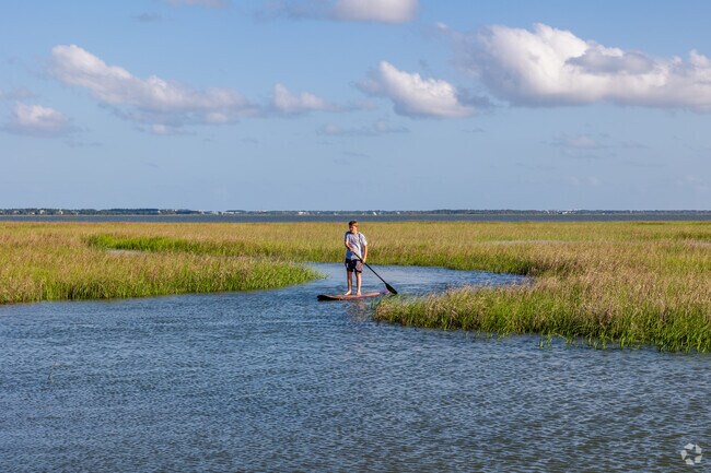 Charleston National locals enjoy paddleboarding on the Copahee Sound in Mount Pleasant.