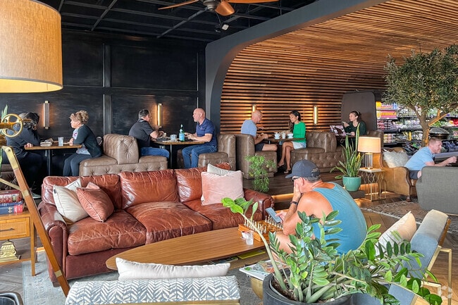 Residents of Coral Ridge Isles often gather for community events and socializing.