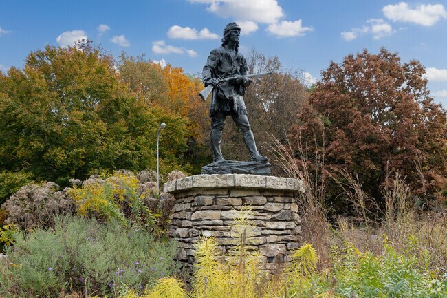 This statue of Daniel Boone is located on a roundabout at one of the entrances to Cherokee Park.