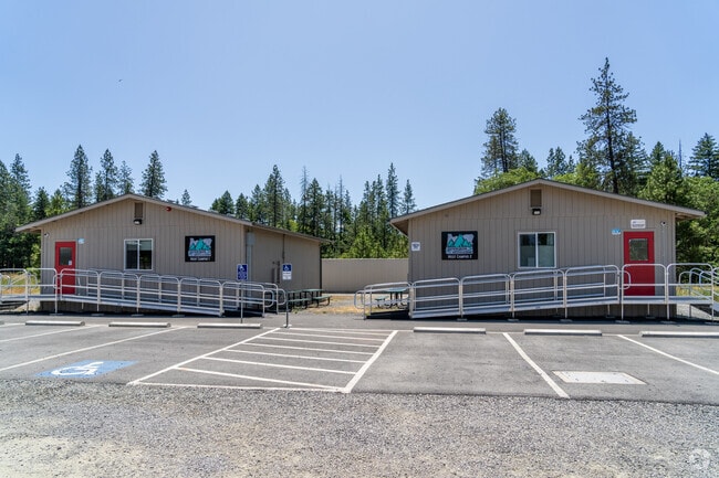 Southern Oregon Success Academy in Cave Junction has multiple buildings for students to learn in.
