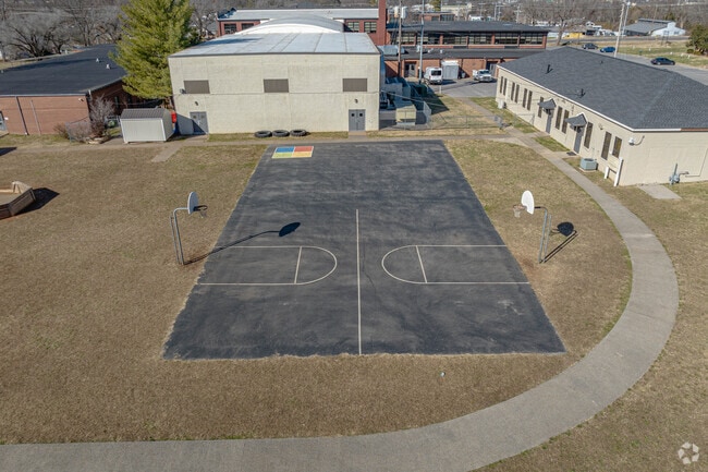 A basketball court can be found behind the McFadden School of Excellence.