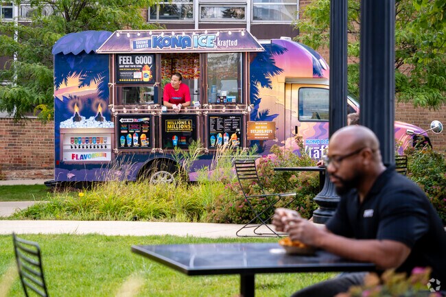 Falling Waters residents head downtown for a lunch break outside.