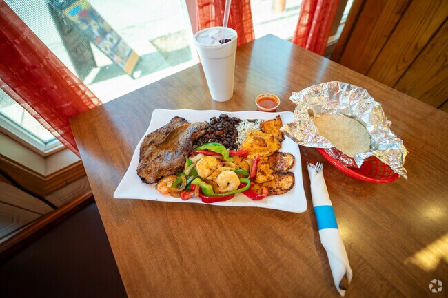 A combination of meats with rice, beans and tortillas from Palencianita Resturant in Pawtucket.