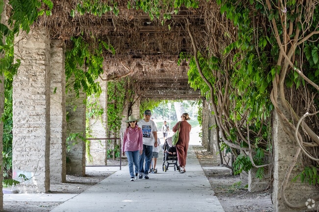 Stroll through the shaded pergola in Brookside Park in Pasadena.
