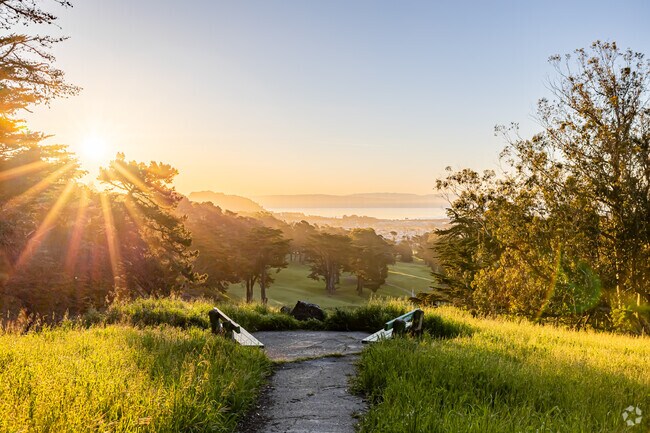 An early morning sunrise bathes John McLaren Park in Excelsior, San Francisco.