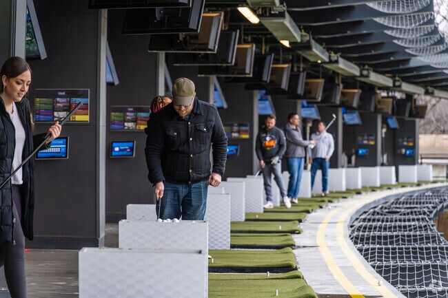 T-Shotz Golf & Entertainment Venue offers residents of New Mark a chance to golf all year long.