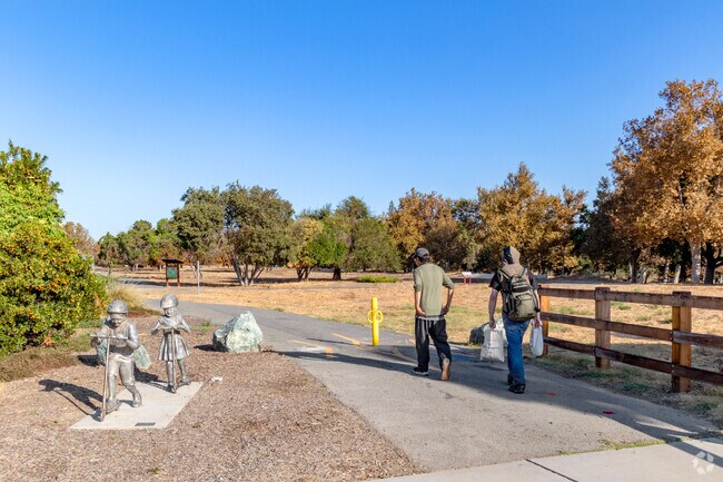 Enjoy a brisk morning walk at Guadalupe River Trail near Hyde Park.