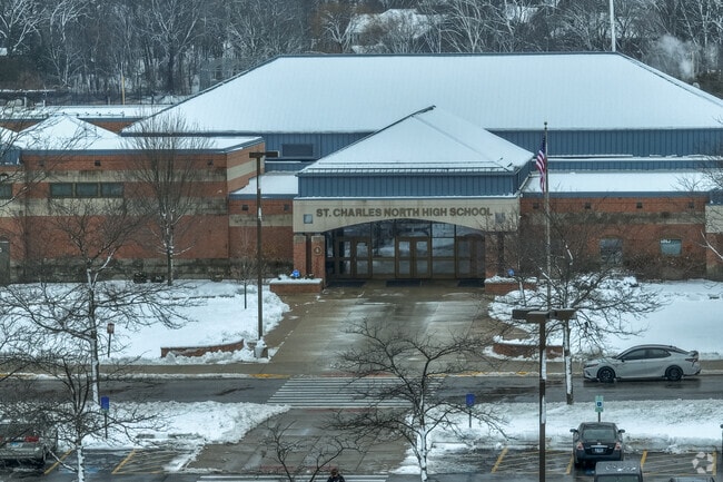 Saint Charles North High School is covered in snow during a January snow storm.