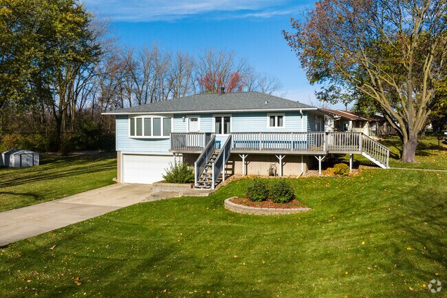 Large two story homes with large lots are found amongst the neighborhood of Carbon Cliff.