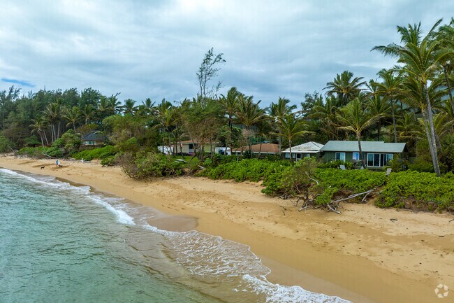 row of beachfront homes near Anahola Beach