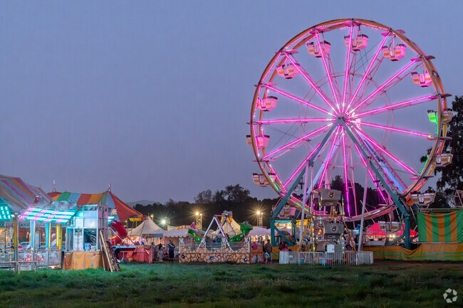 As the sun sets, the LA Spring Fair comes alive with vendors rides games and more.