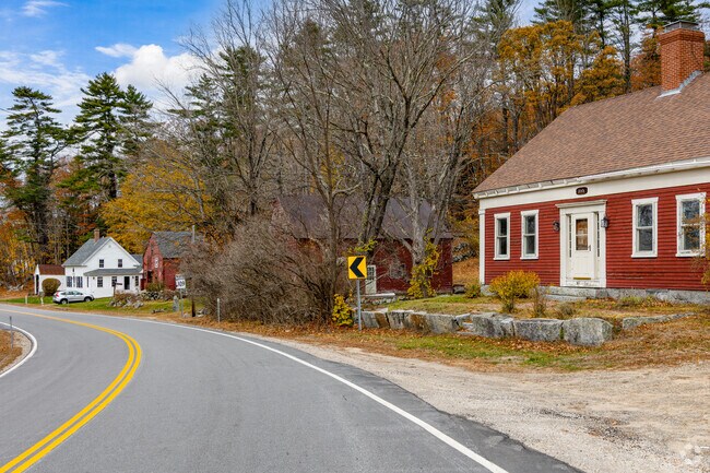 Tuftonboro’s winding roads lead to charming homes and rustic barns.