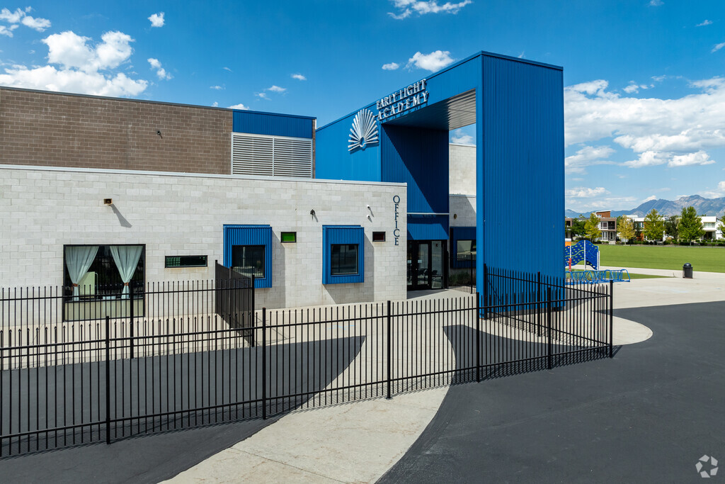 Early Light Academy is a modern building with blue details.