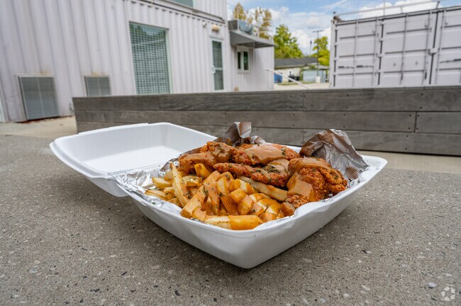 JB's Grill, at Boxspot in Kinsman, serves up crispy wings and seasoned fries.