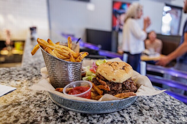 Blackstone Gastropub offers smash burgers and hand crafted cocktails just outside the YMCA neighborhood.