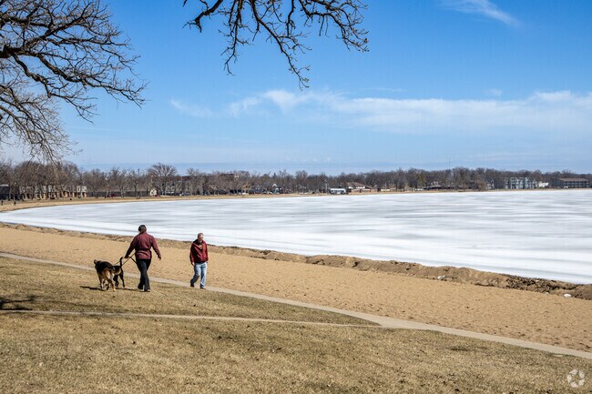 You can often find people walking along the beach of Detroit Lake.